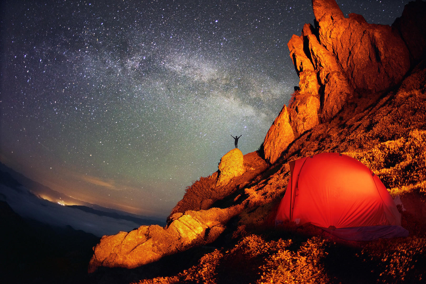 A tent under the Milky Way with mountain scenery — one clear night out of nine, when the sky over Torres del Paine finally opened